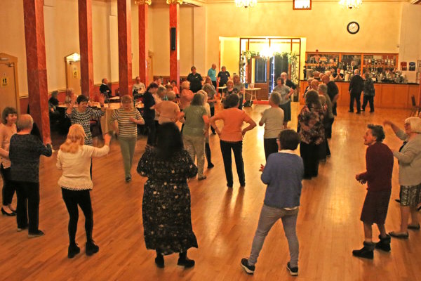 A group of people dancing at a Dancing with Dementia event